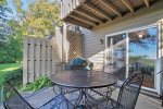 Main level patio has outdoor furniture